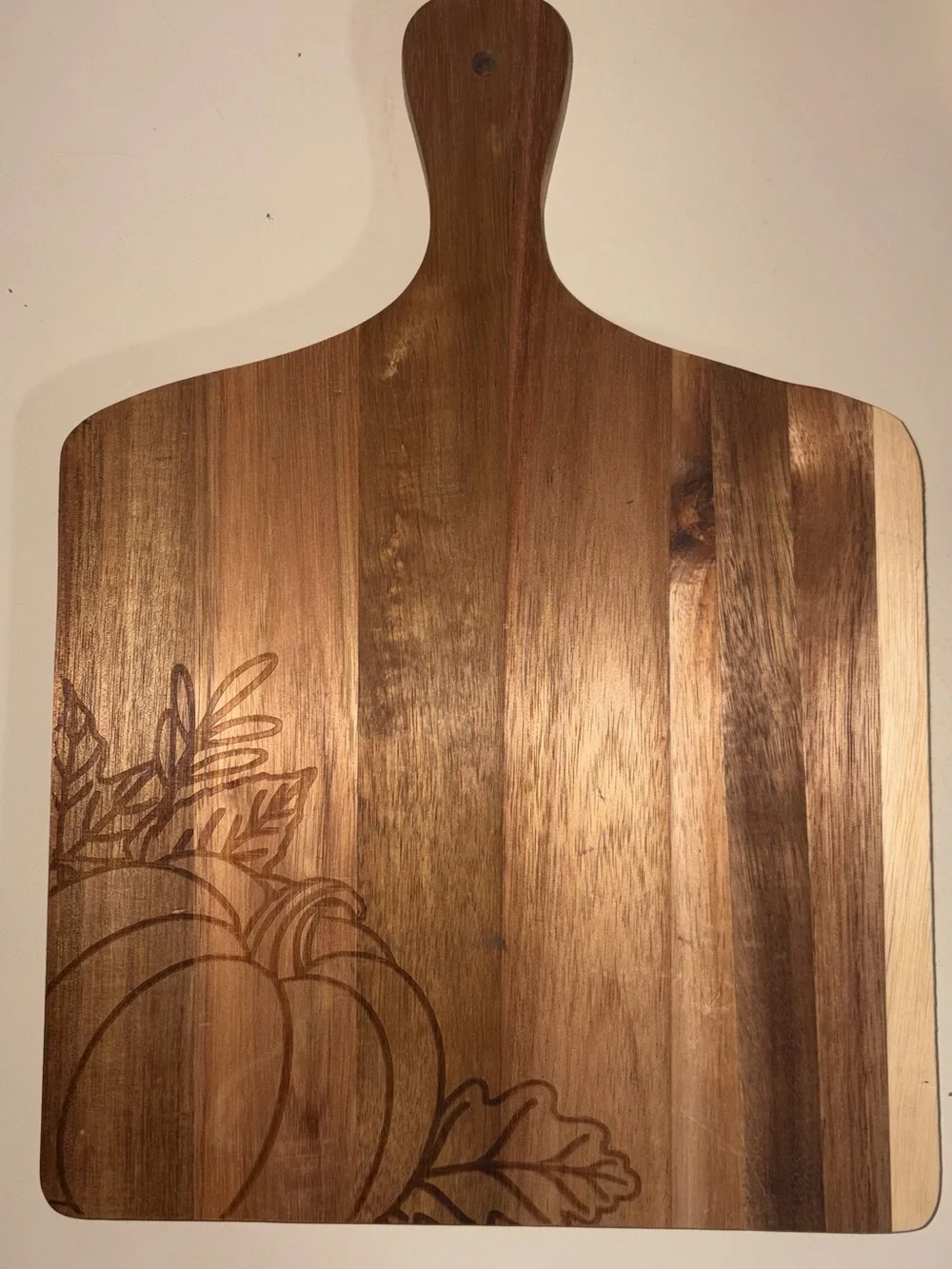 Cutting board with pumpkin engraving